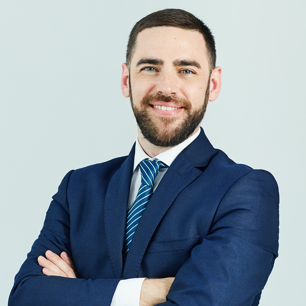 Smiling successful man in suit